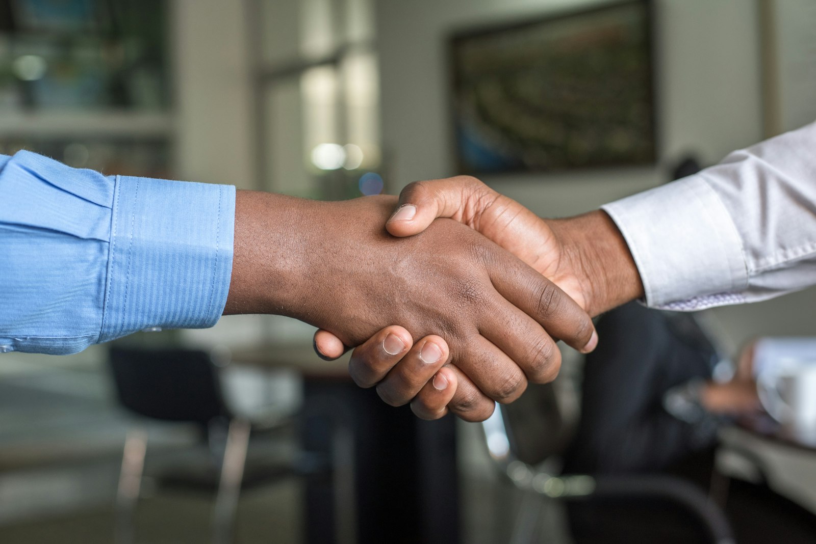 A handshake closing a real-estate deal